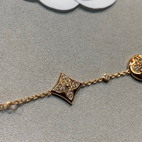 STAR AND SUN 4 MOTIFS GOLD DIAMONDS BRACELET