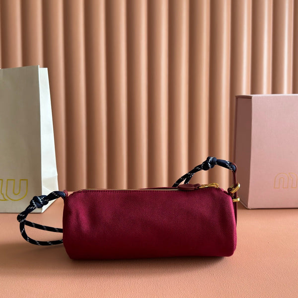 Miu Miu Adventure Nappa Canvas Bucket Bag 22 Dark Pink in Fabric 285321
