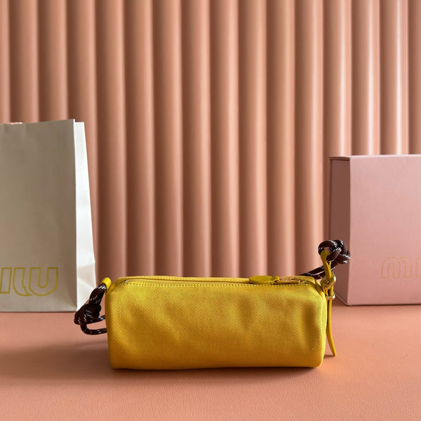 Miu Miu Adventure Nappa Canvas Bucket Bag 22 Yellow in Fabric 285323