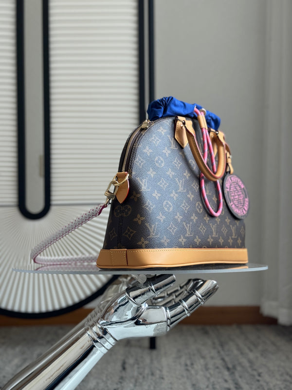 Louis Vuitton Alma Handbag 37 Brown in Canvas Cowhide