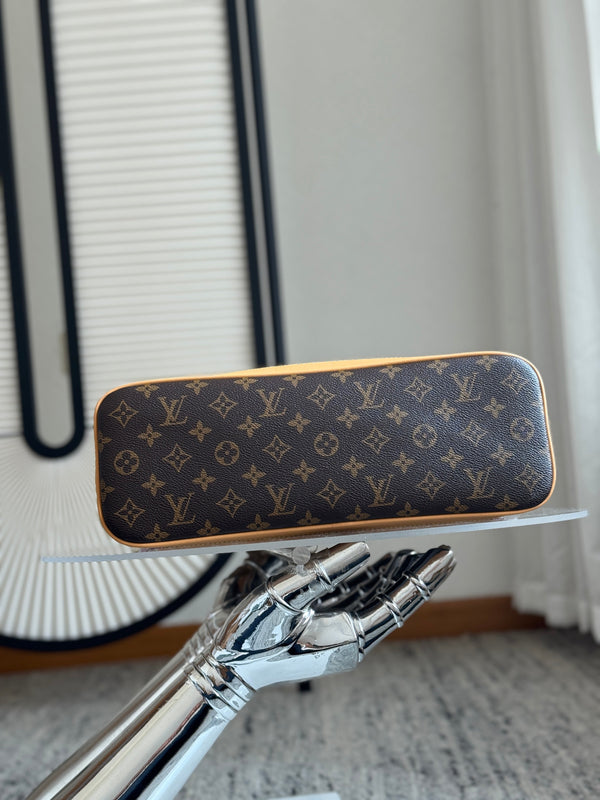 Louis Vuitton Alma Handbag 37 Brown in Canvas Cowhide