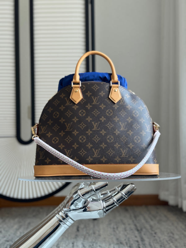 Louis Vuitton Alma Handbag 37 Brown in Canvas Cowhide