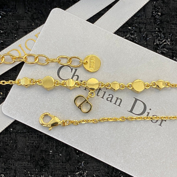 CD 26S CD Logo CZ Station Necklace In Gold Tone Metal 631851
