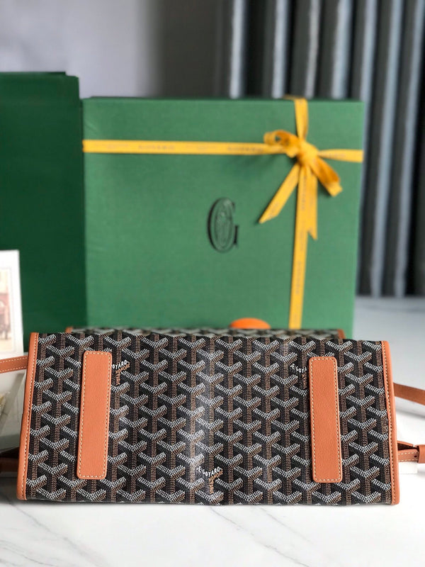 SAINT LÉGER BACKPACK 35 IN BROWN GOYARDINE CANVAS AND CALFSKIN WITH CARTOON PATCH