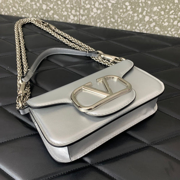 Valentino Garavani Small Locò Shoulder Bag Sliver Metallic Leather