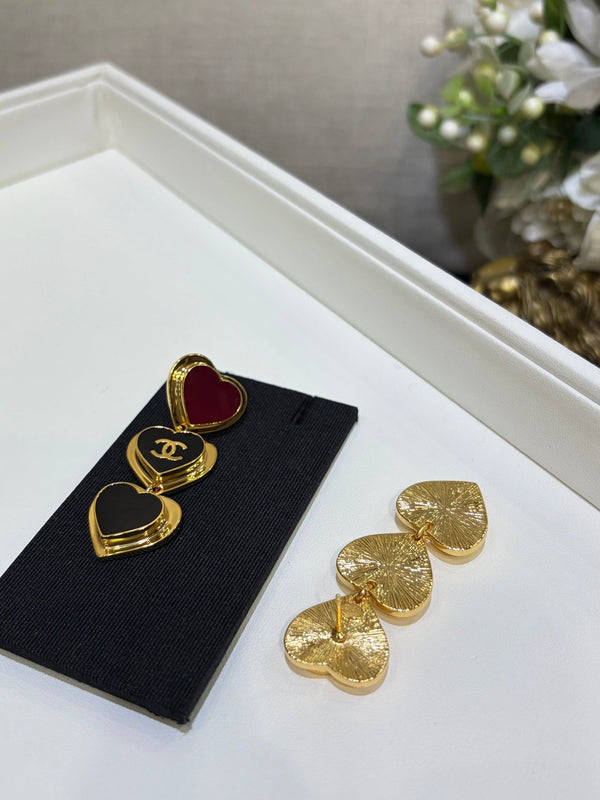 Chanel 2026 Gold Double C Black Heart Enamel Long Stud Earrings