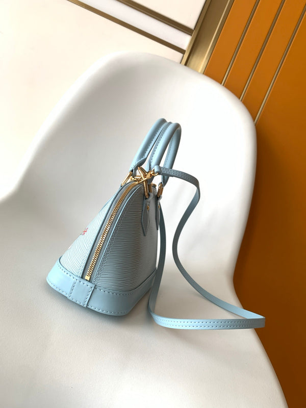 LV x TM Alma BB M13670 Handbag 23.5cm Light Blue Epi Grained Cowhide