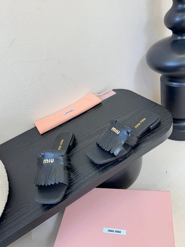 Miu 26s Flat Slippers In Black Calfskin
