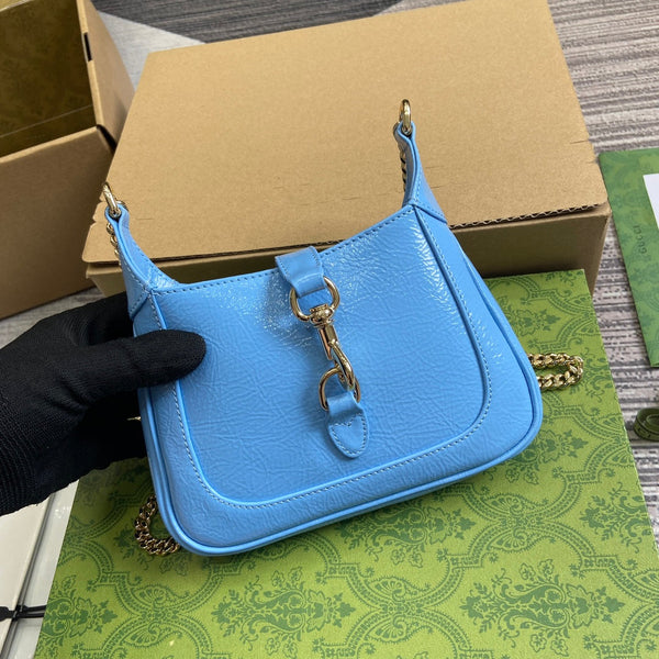 JACKIE NOTTE MINI BAG 19 IN OCEAN BLUE CRACKED LACQUER CALFSKIN GOLD HARDWARE