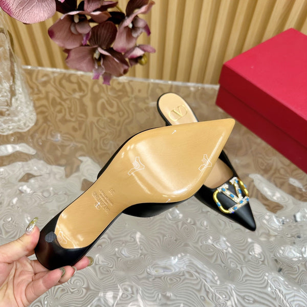 HIGH PUMP MULE 80MM IN BLACK CALFSKIN