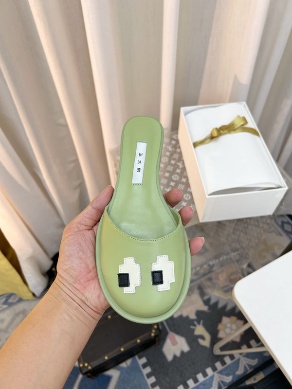 The Row Semi Slippers Olive Green Sheepskin 827493