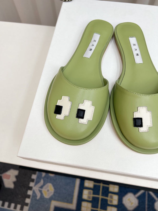 The Row Semi Slippers Olive Green Sheepskin 827493