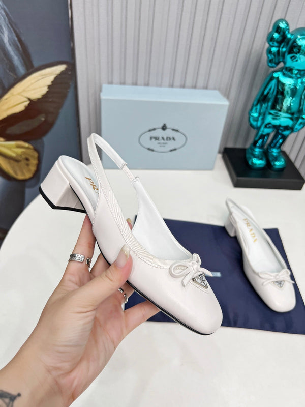 Prad 26s Round Toe Slingback Pumps 40mm In White Calfskin With Bow