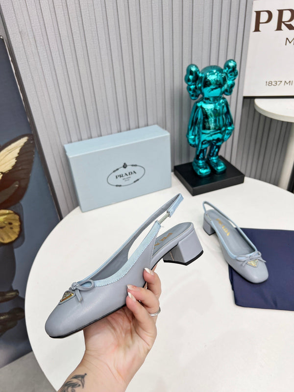 Prad 26s Round Toe Slingback Pumps 40mm In Light Blue Calfskin With Bow