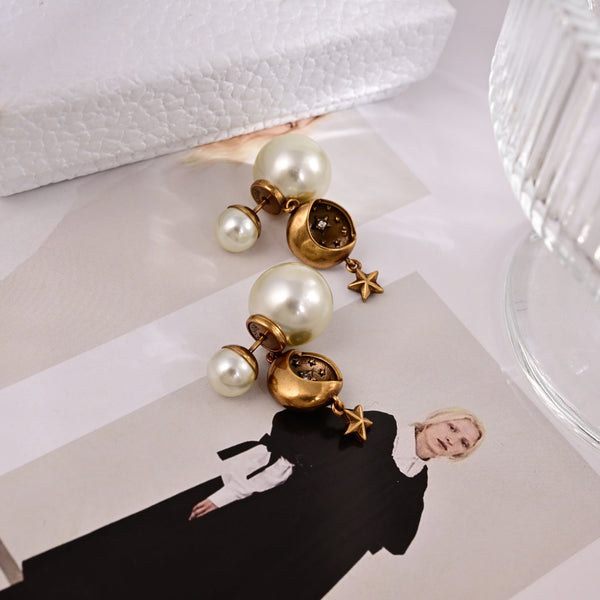 CD 26S Star Logo Pearl Drop Earrings In Gold Tone Metal 629949