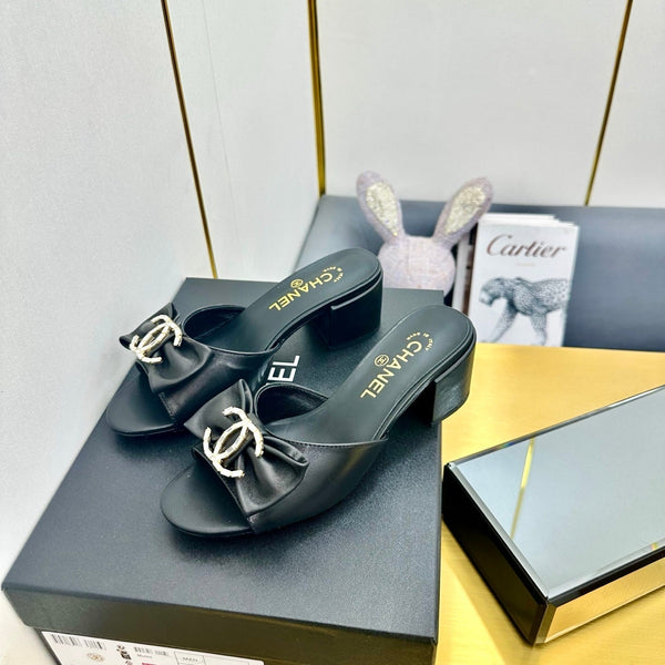 cc 25 bow mule sandal 50mm black sheepskin 238478