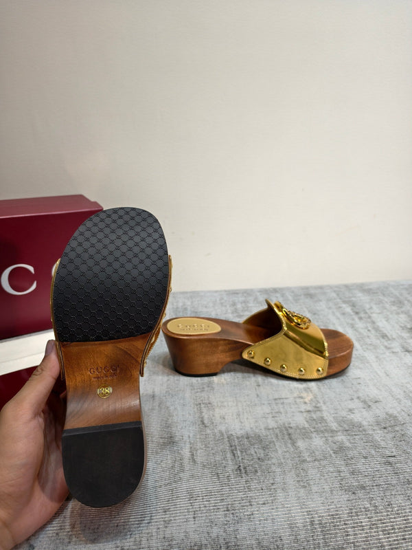 GG Wooden Clog Sandals Gold Leather 864268