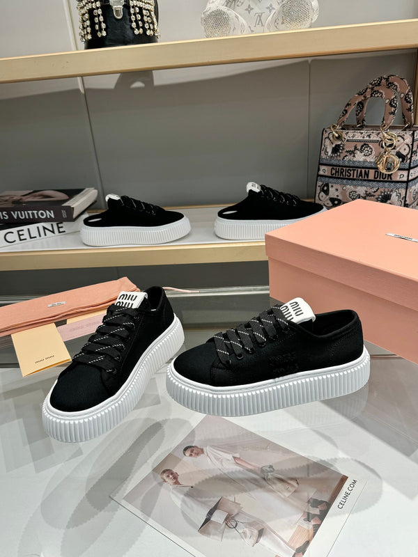 Miu logo-patch sneakers 45mm Black Canvas 456831