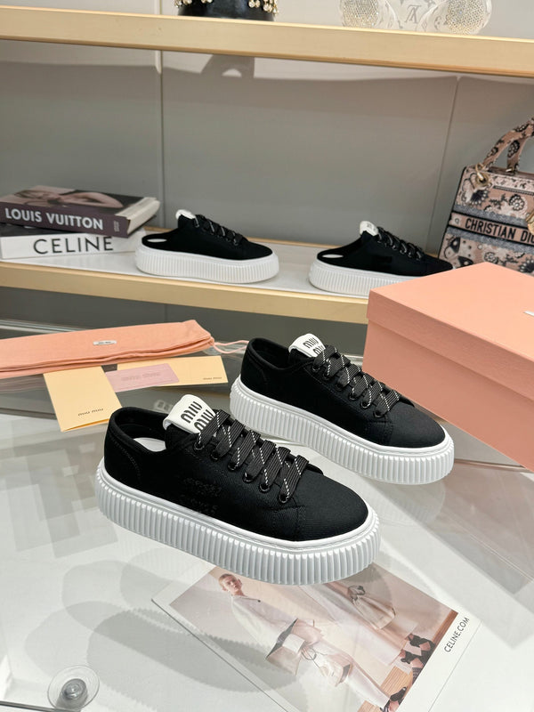 Miu logo-patch sneakers 45mm Black Canvas 456831