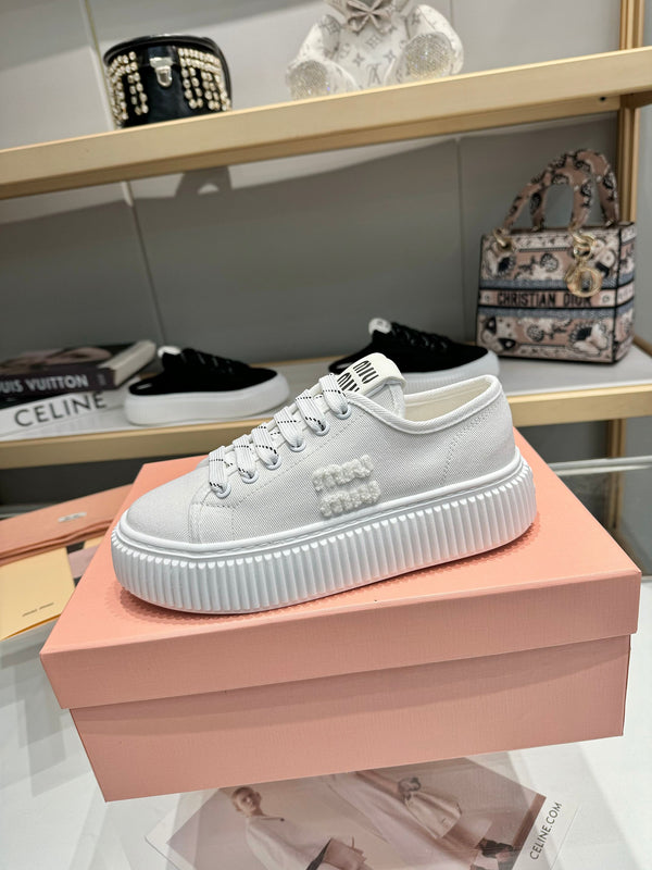 Miu logo-patch sneakers 45mm White Canvas 456833
