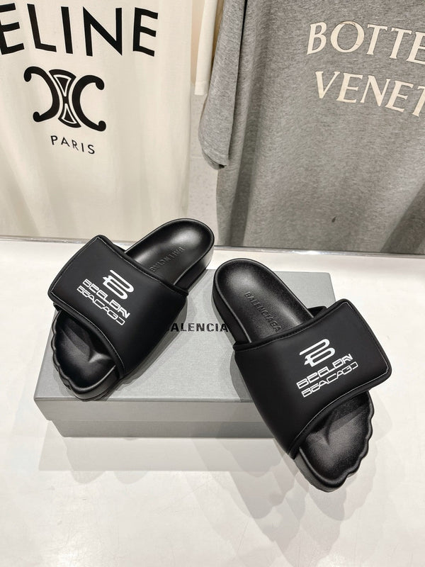 SLIDE SANDALS IN BLACK NYLON AND RUBBER WHITE PRINT
