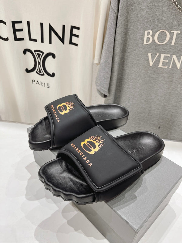 SLIDE SANDALS IN BLACK NYLON AND RUBBER YELLOW PRINT