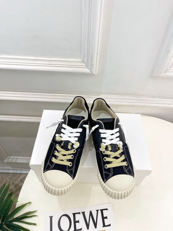 MM 26s New Evolution Sneakers Black Canvas Calfskin 947483
