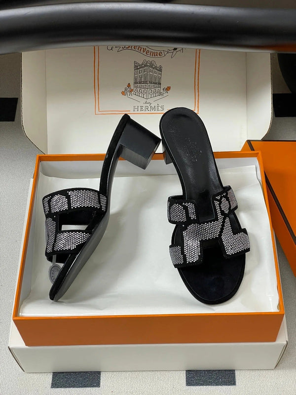HM 25S ORAN HIGH‑HEEL SANDAL 50 MM IN BLACK LAMBSKIN WITH WHITE STONE DETAILS