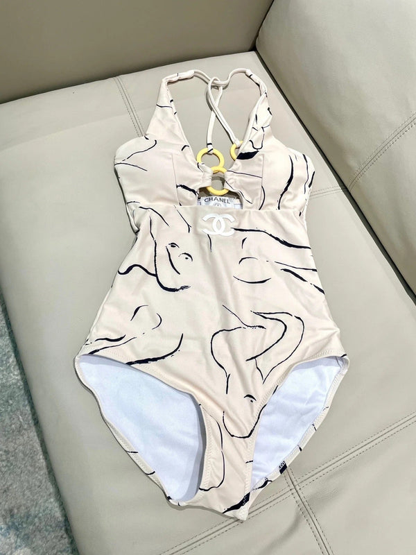 CC BIKINI SWIMSUIT SET IN CREAMY WHITE MIXED WITH CURVED BLACK DETAIL 608919