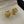 ANAGRAM GOLD STUD EARRINGS