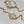 CLOVER ONYX MOP 16 MOTIF GOLD 130CM NECKLACE
