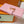 VERTICAL COMPACT WALLET PINK CAPUCINES