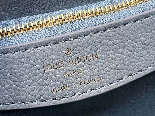 diane 24 light blue monogram empreinte leather