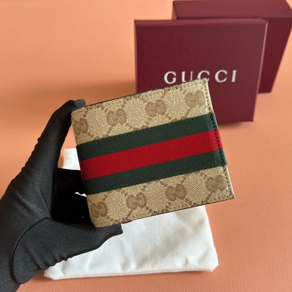 Gucci Bi-fold wallet Brown in Canvas 284913