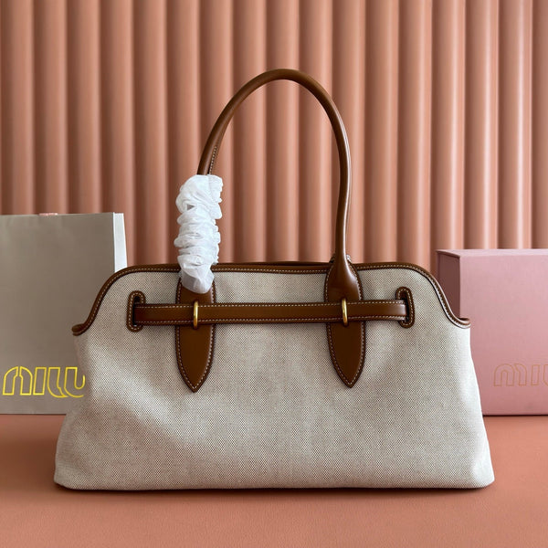 Miu Miu Aventure Handbag 44 Beige in Canvas 285306