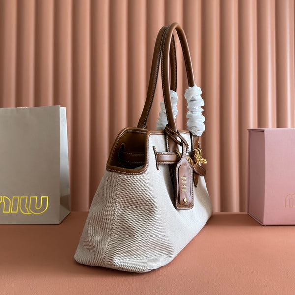 Miu Miu Aventure Handbag 44 Beige in Canvas 285306