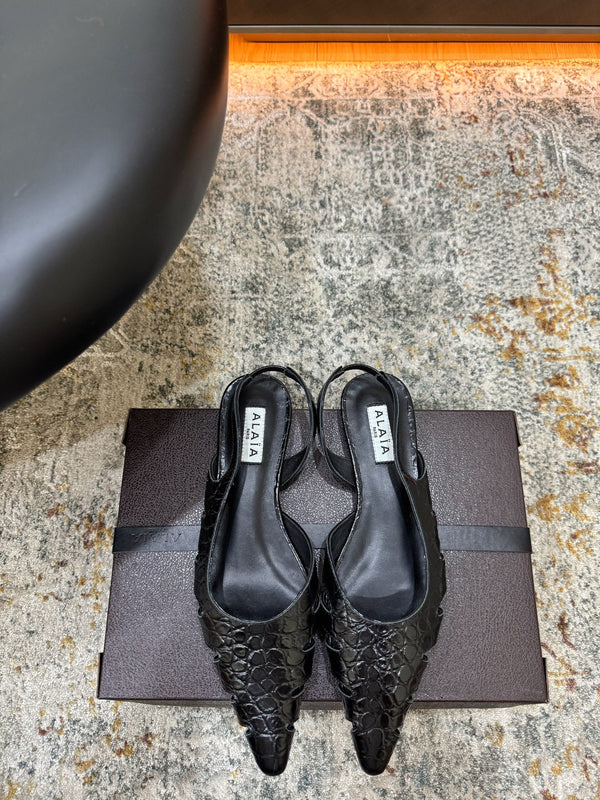 Alaia Snake Print Cutout Slingback Flats Black Cowhide Leather 881558