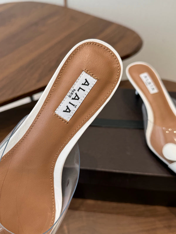 Alaia Daisy Mules 55mm Cowhide Clear PVC 889945