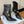 BM 26S Pointed-Toe Boots 10.5cm Gold Logo Buttons Black Leather 111356