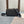 MEDIUM MESSENGER BAG 23 IN BLACK TRIOMPHE CANVAS