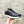 HM EMBOSSED ICON SNEAKER BLACK CALFSKIN