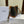 BUCKET 30 IN BLACK TRIOMPHE CANVAS AND RED BROWN CALFSKIN TRIM