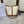 BUCKET 33 IN WHITE TRIOMPHE CANVAS AND BRONZE BROWN CALFSKIN TRIM