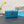 CARO SLIM POUCH 21 BAG IN SKY BLUE CALFSKIN