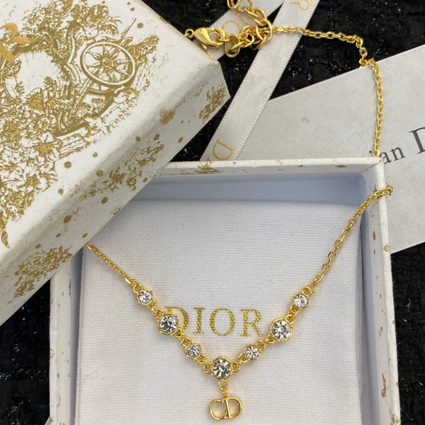 CD 26S CD Logo CZ Station Necklace In Gold Tone Metal 631851