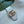 MEDIUM SHOULDER BAG 39 IN WHITE CALFSKIN GOLD HARDWARE