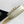 teen besace triomphe 18.5 white calfskin with chain