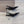OPYUM SILVER HEEL SLINGBACK PUMPS IN BLACK GLOSSY CALFSKIN