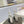 SL TRIBUTE FLATFORM SANDALS SILVER CALFSKIN