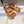 CHLOÉ CROSS STRAP SANDAL IN BRONZE BROWN RUBBER WITH GOLD HARDWARE